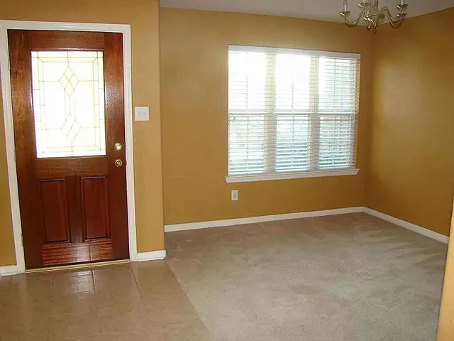 an empty room with windows