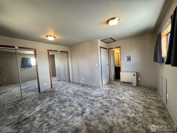 a view of a livingroom with a fireplace