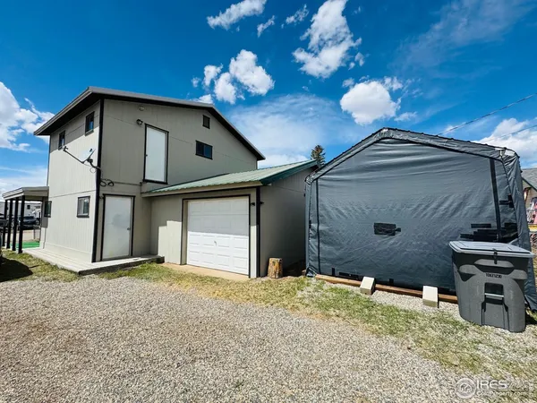 a house view with a backyard space