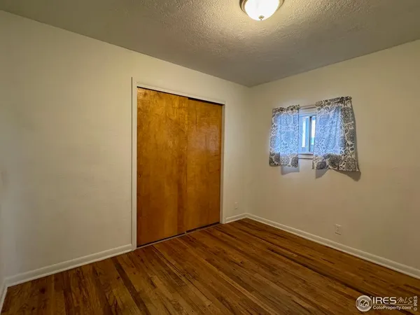 a view of small space with wooden floor