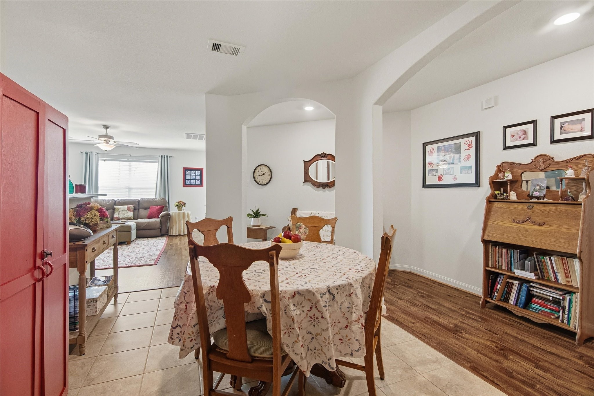 1306 Paradise Found Drive Rosharon, TX 77583 - Photo 11 of 36 a view of a dining room with furniture and a rug