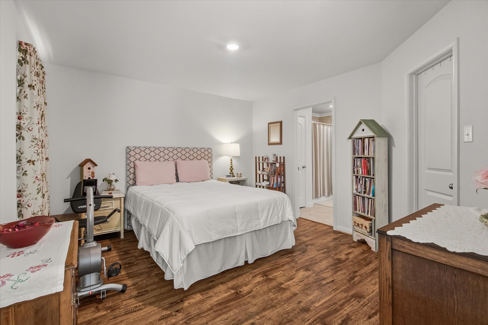 1306 Paradise Found Drive Rosharon, TX 77583 - Photo 22 of 36 a bedroom with a bed and a dresser