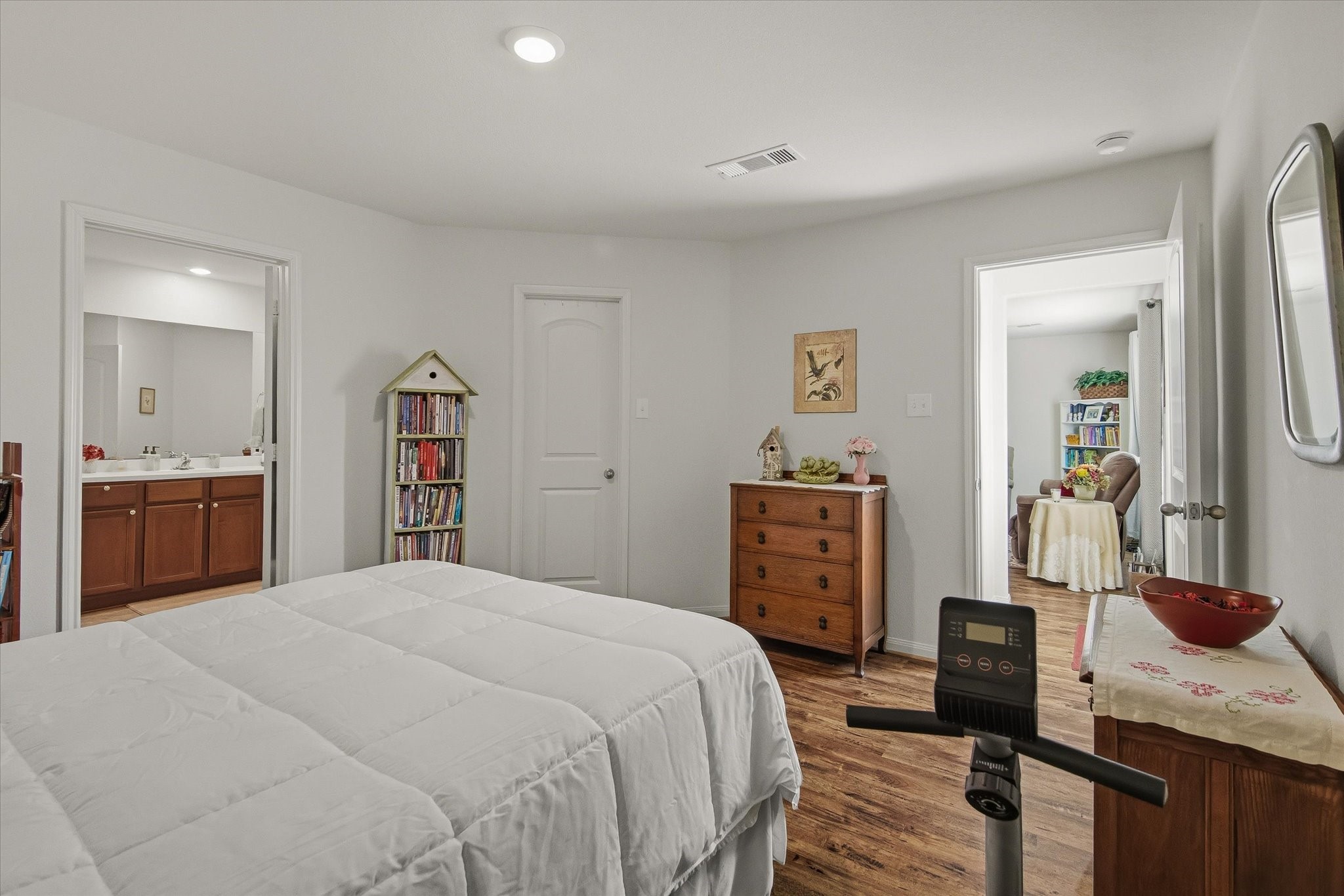 1306 Paradise Found Drive Rosharon, TX 77583 - Photo 24 of 36 a bedroom with a bed and walk in closet