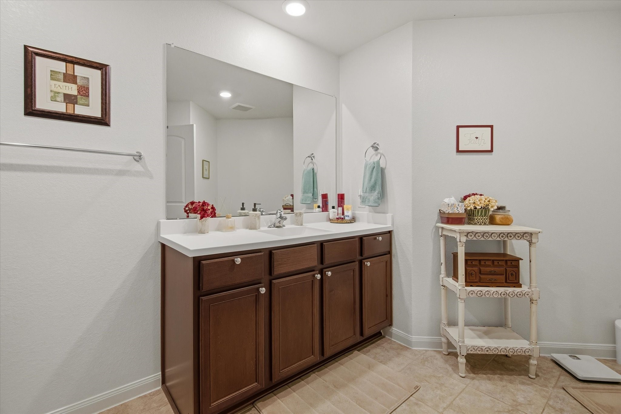 1306 Paradise Found Drive Rosharon, TX 77583 - Photo 26 of 36 a bathroom with a sink and a mirror