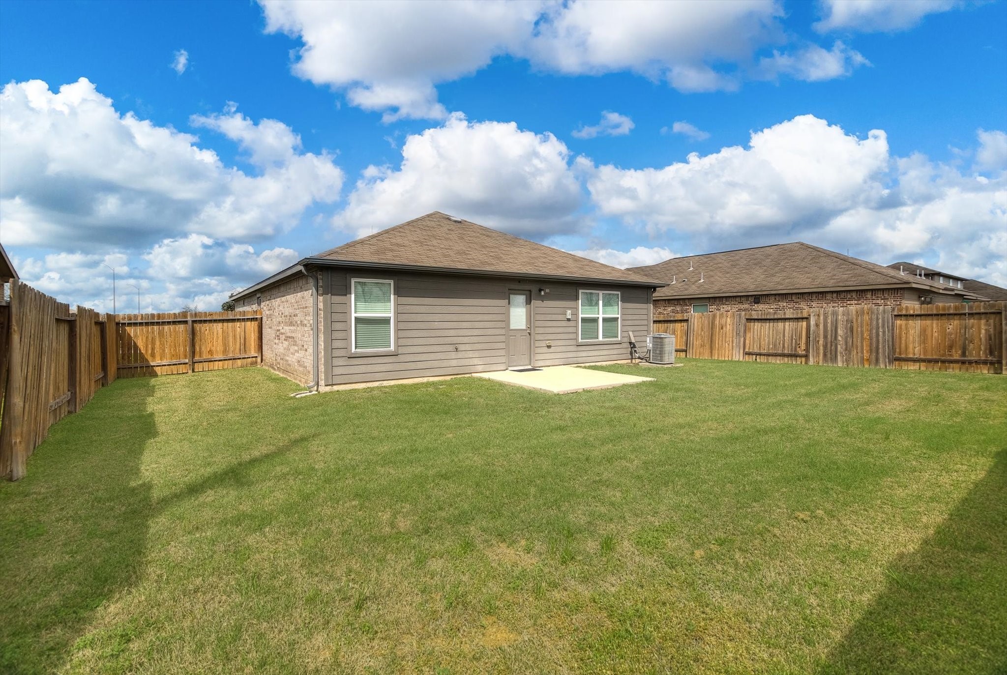 1306 Paradise Found Drive Rosharon, TX 77583 - Photo 29 of 36 a front view of a house with a garden