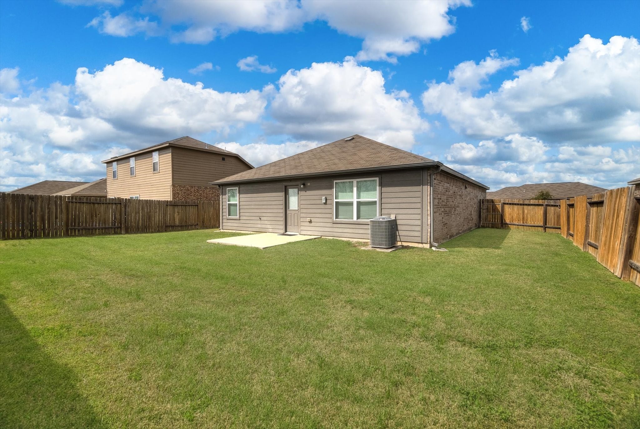 1306 Paradise Found Drive Rosharon, TX 77583 - Photo 30 of 36 a front view of a house with yard