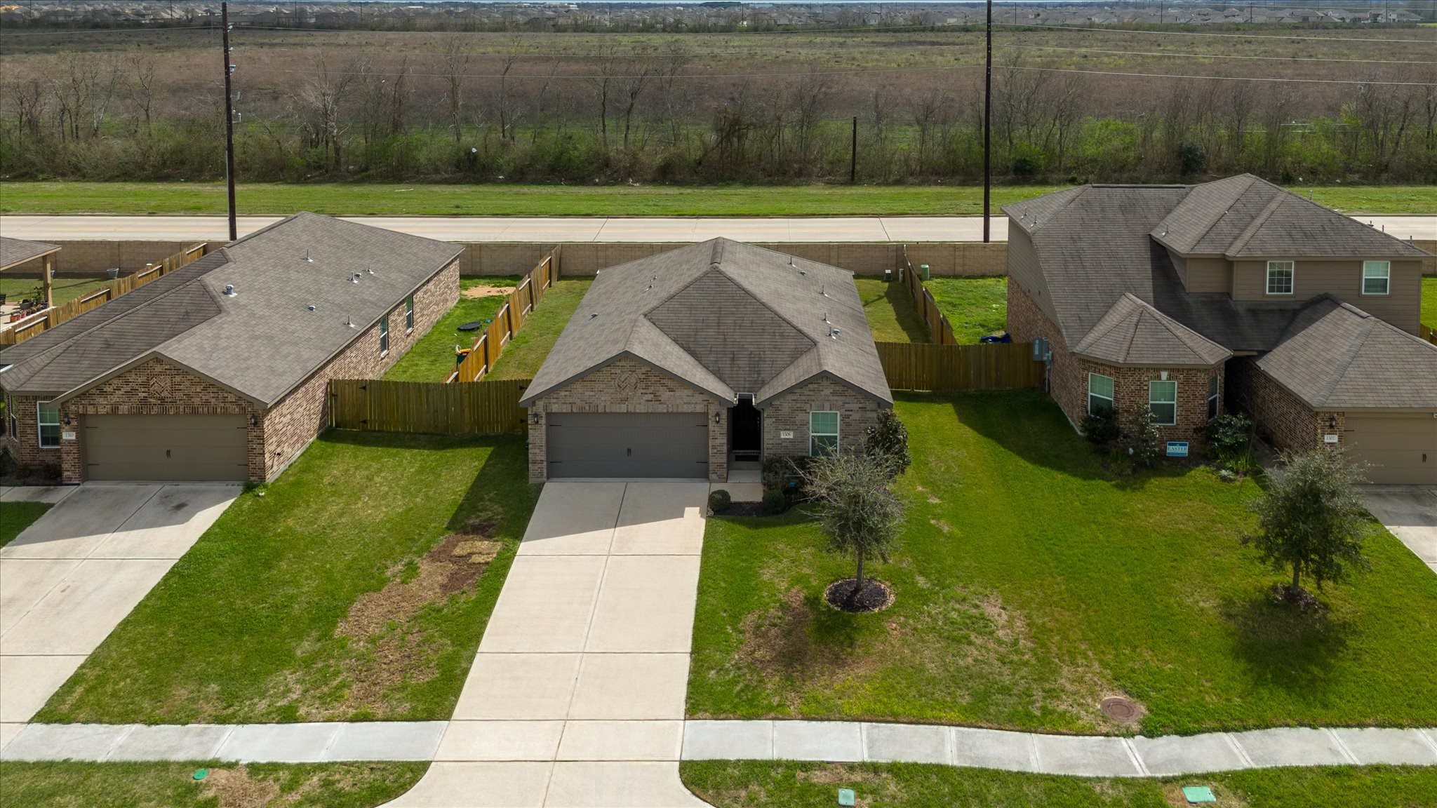 1306 Paradise Found Drive Rosharon, TX 77583 - Photo 33 of 36 a view of yard with patio