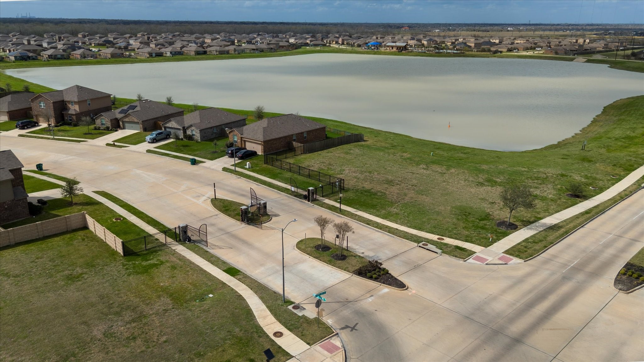 1306 Paradise Found Drive Rosharon, TX 77583 - Photo 35 of 36 a view of a lake with a outdoor space