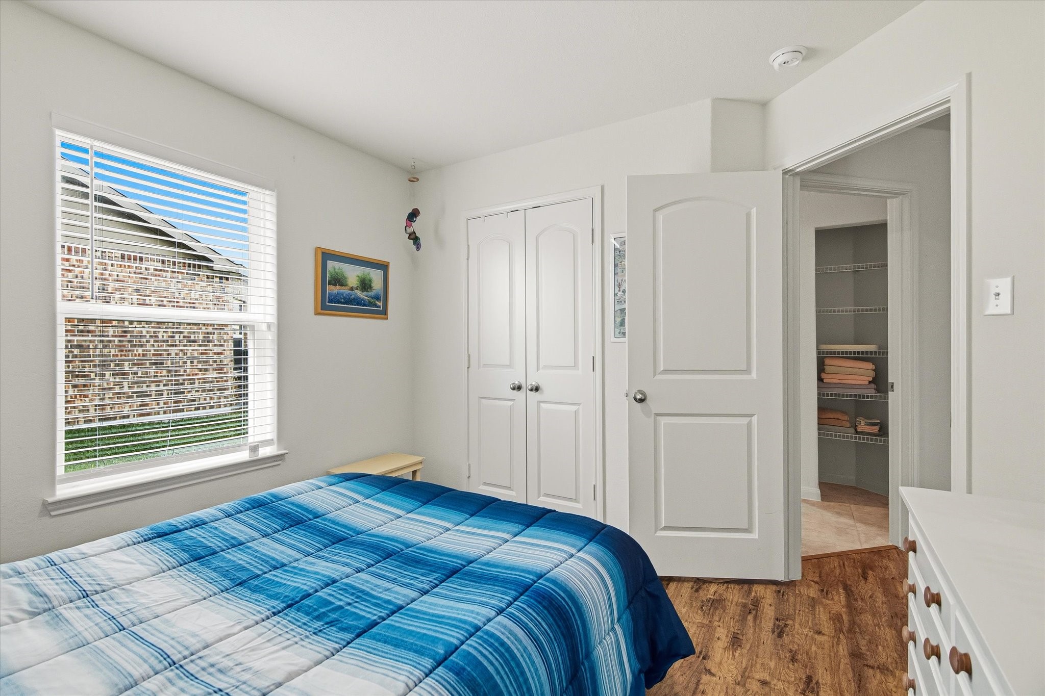 1306 Paradise Found Drive Rosharon, TX 77583 - Photo 6 of 36 a bedroom with a bed and a window