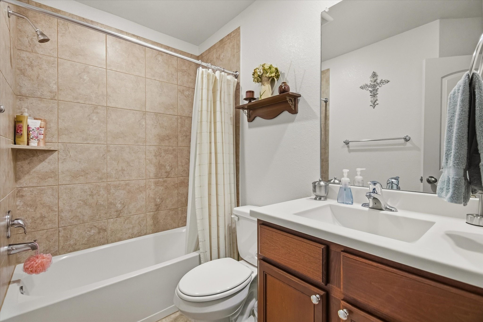 1306 Paradise Found Drive Rosharon, TX 77583 - Photo 7 of 36 a bathroom with a sink toilet and shower