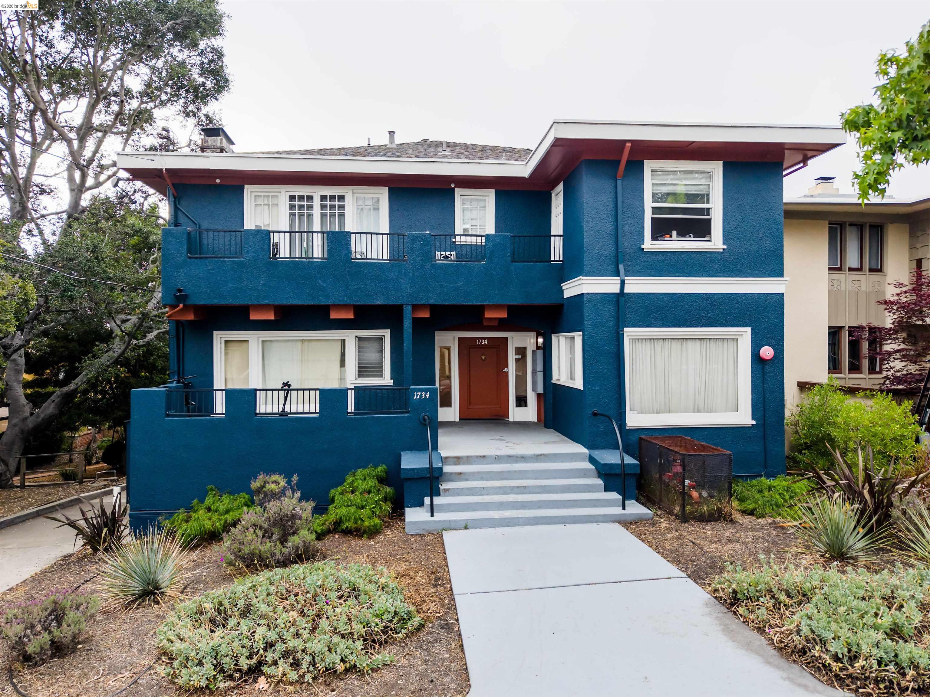1734 Spruce Street Berkeley, CA 94709 - Photo 1 of 8 a front view of a house