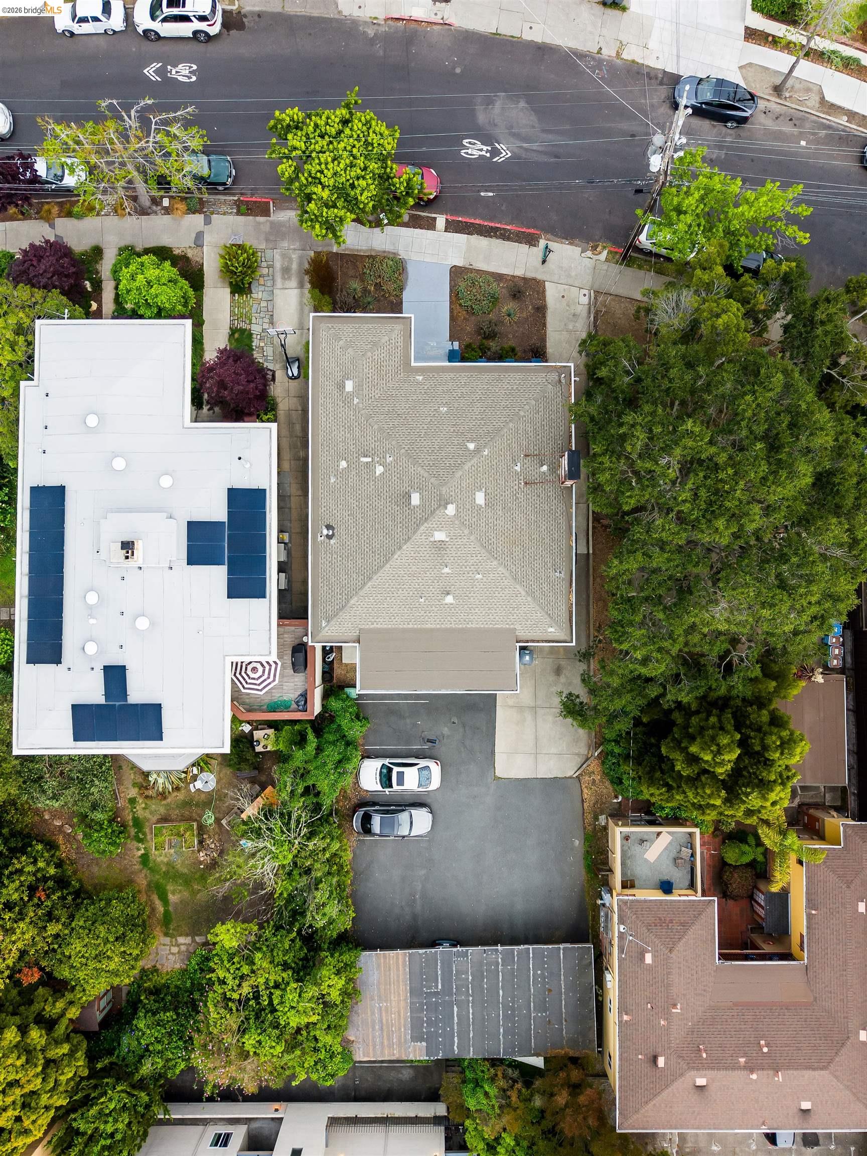 1734 Spruce Street Berkeley, CA 94709 - Photo 5 of 8 an aerial view of a house with a yard