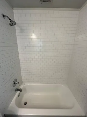 a bathroom with a tub