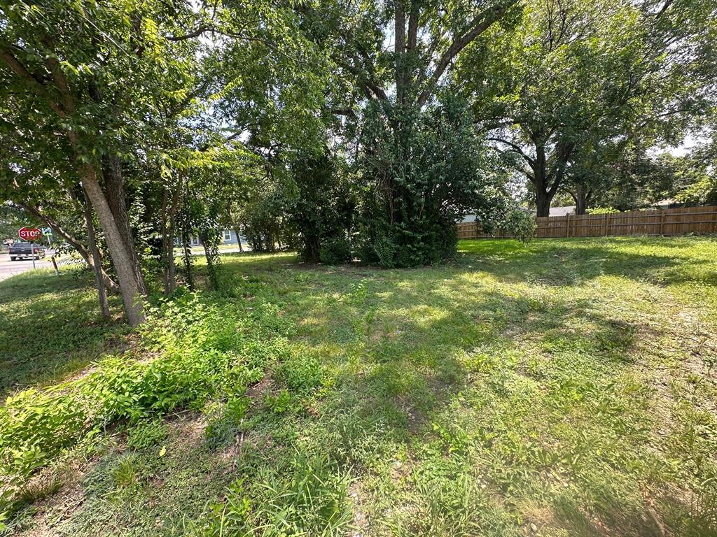 2504 McKenzie Avenue Waco, TX 76708 - Photo 3 of 5 a view of outdoor space with deck and yard