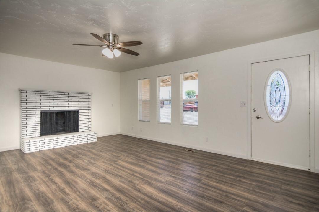 186 Southwest D Street Madras, OR 97741 - Photo 13 of 44 All new floors! Fireplace in Livingroom