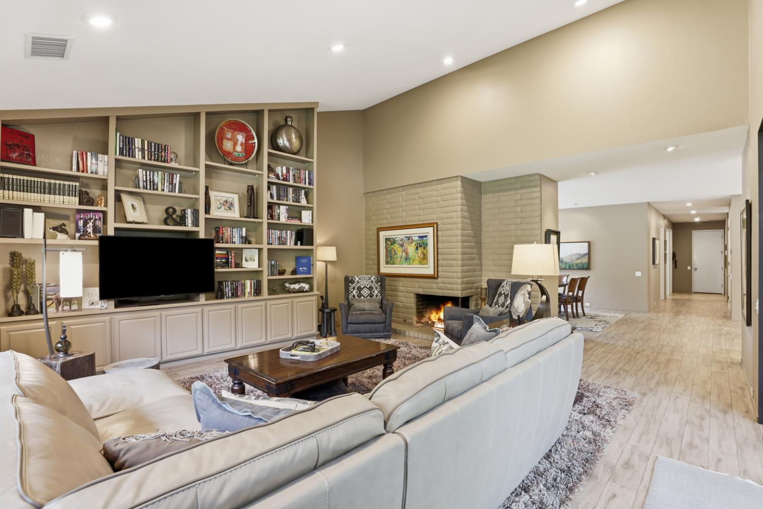 11575 Splitrock Court Gold River, CA 95670 - Photo 27 of 90 a living room with furniture and a flat screen tv