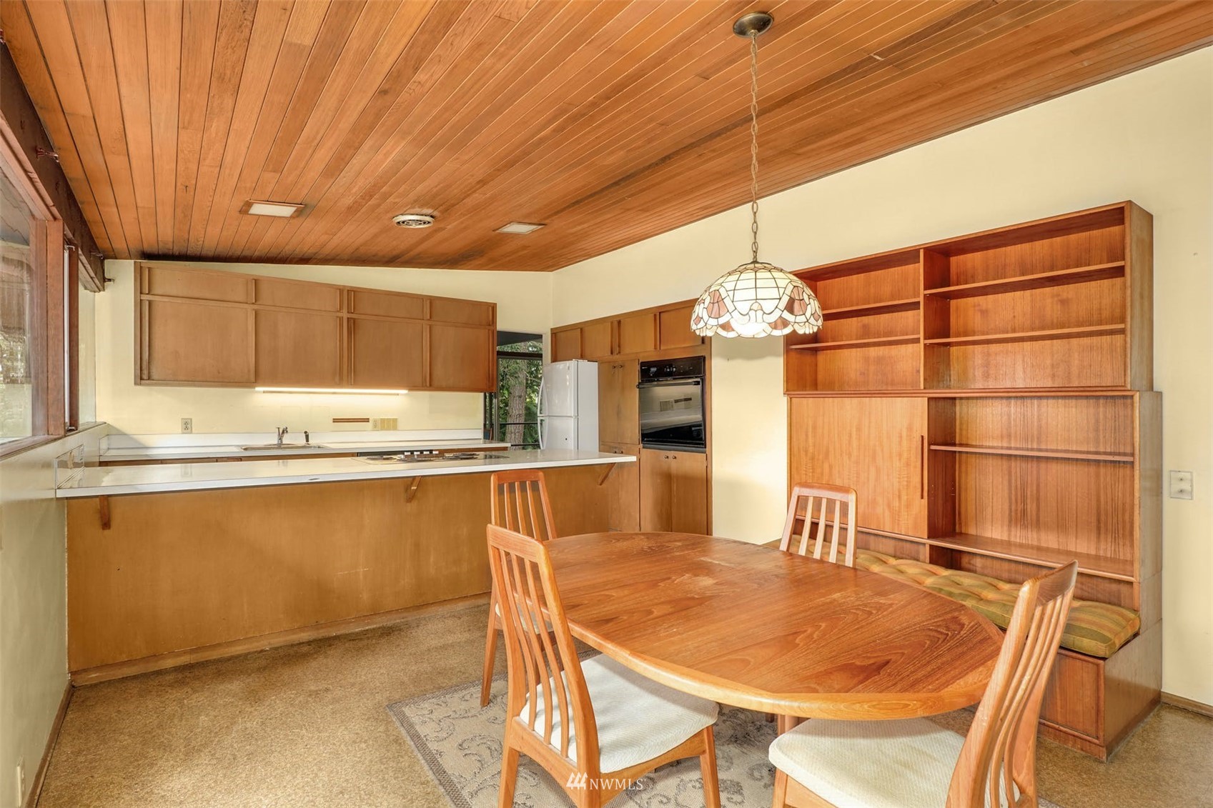 3309 Evergreen Point Road Medina, WA 98039 - Photo 12 of 25 a kitchen with stainless steel appliances granite countertop a sink and cabinets