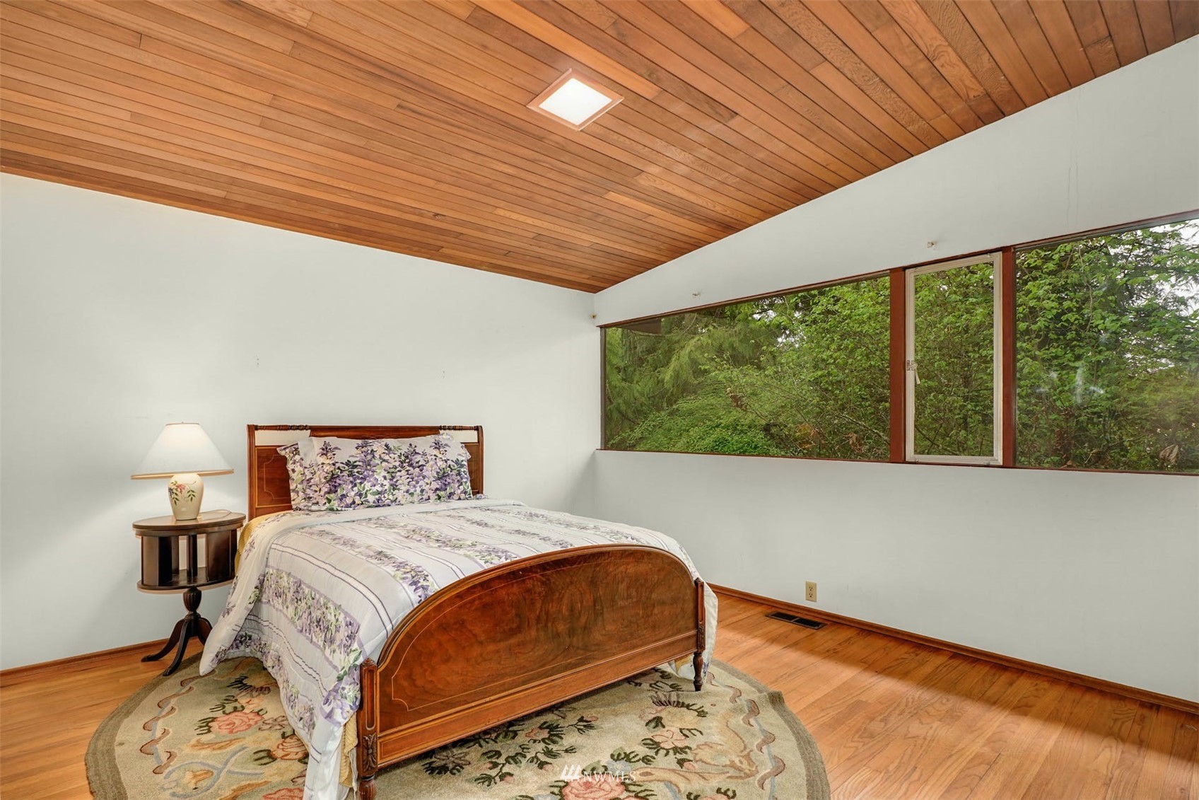 3309 Evergreen Point Road Medina, WA 98039 - Photo 15 of 25 a bedroom with a bed and a large window