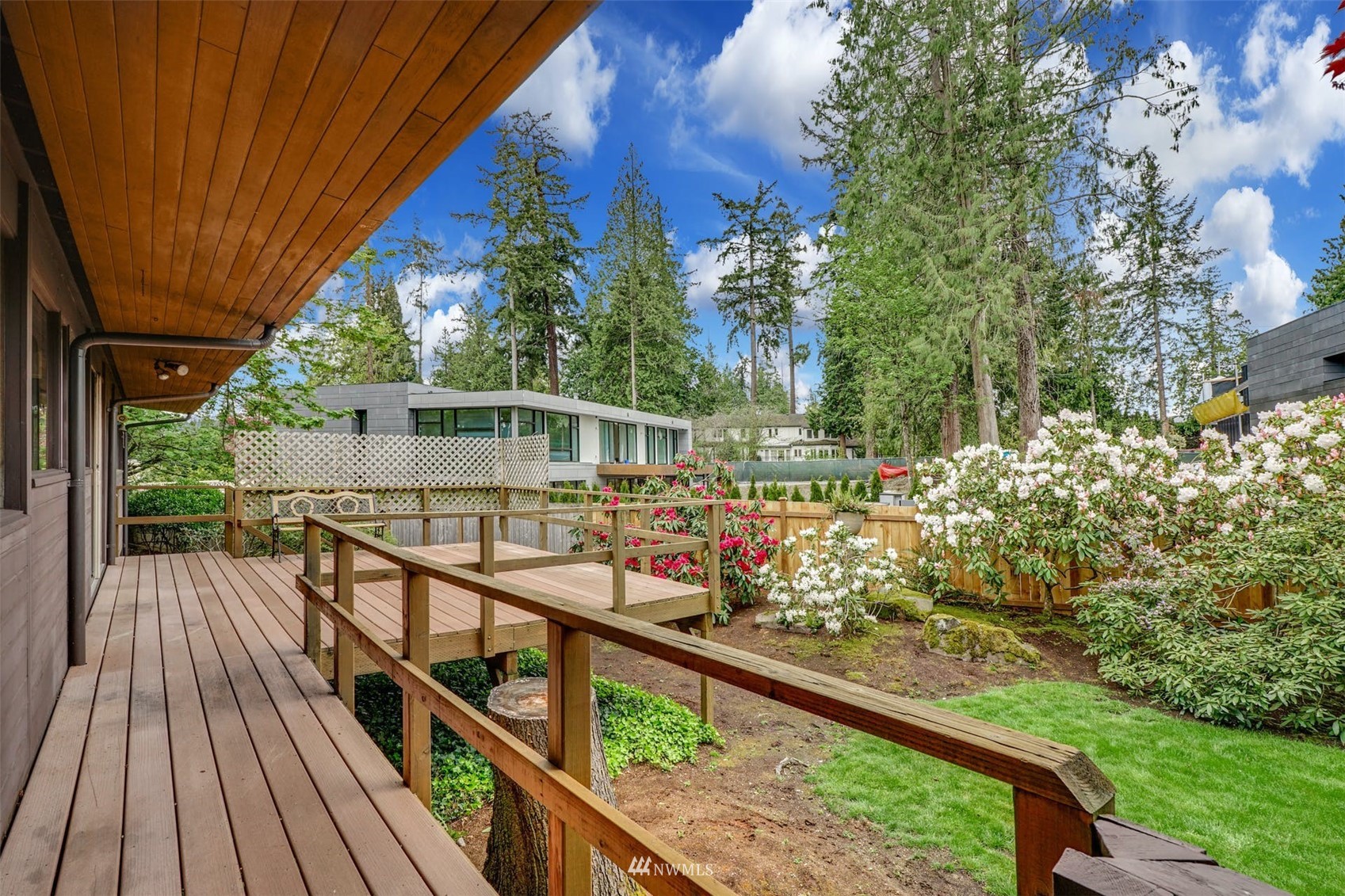 3309 Evergreen Point Road Medina, WA 98039 - Photo 16 of 25 a view of a balcony with wooden floor