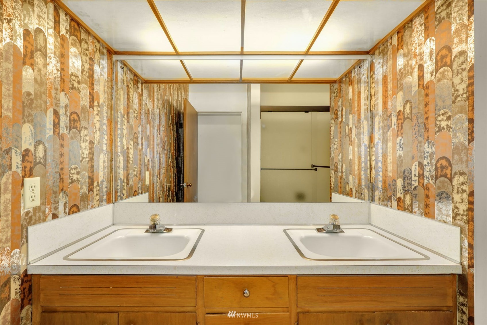 3309 Evergreen Point Road Medina, WA 98039 - Photo 20 of 25 a bathroom with a sink and a mirror