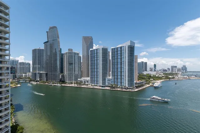 a view of a city with tall buildings