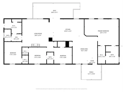 a kitchen with a sink and view of living room
