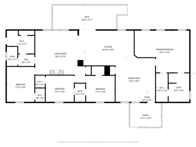 a kitchen with a sink and view of living room