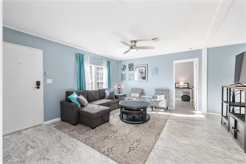 a bathroom with a toilet a sink and a mirror