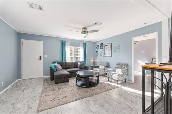 a view of outdoor space with wooden floor and fence