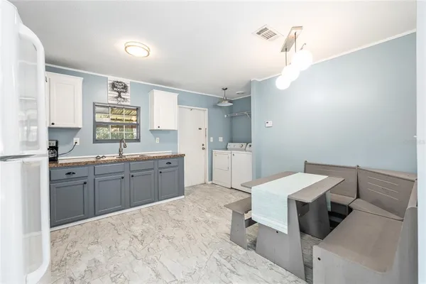 a view of a swimming pool with a yard