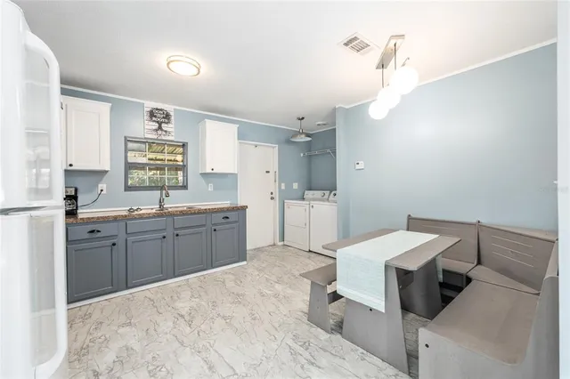 a view of a swimming pool with a yard