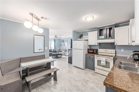 a view of a yard with swimming pool