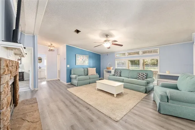 a spacious bathroom with a double vanity sink a mirror and a shower