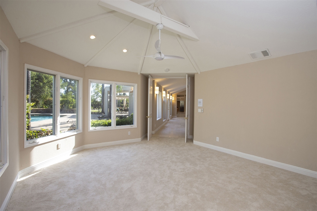 3467 Western Springs Road Encinitas, CA 92024 - Photo 19 of 25 Secondary master suite on opposite end of home with views of the pool and grounds