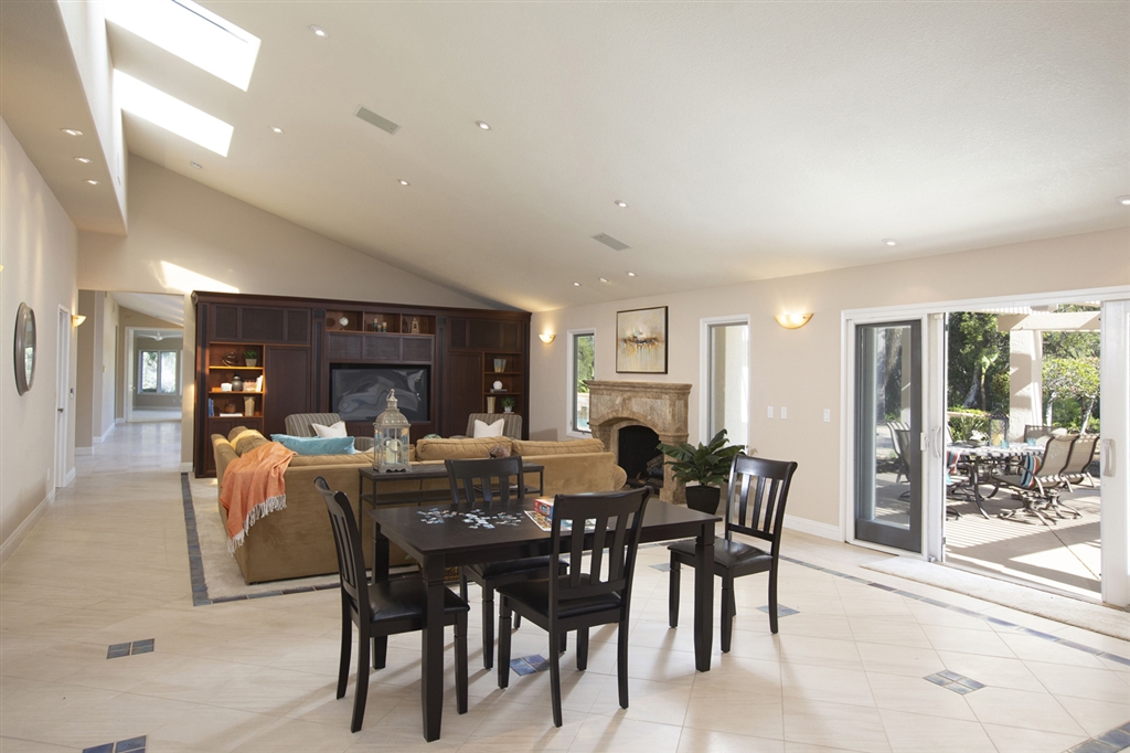 3467 Western Springs Road Encinitas, CA 92024 - Photo 10 of 25 Kitchen opens to great room with soaring ceiling and multiple skylights
