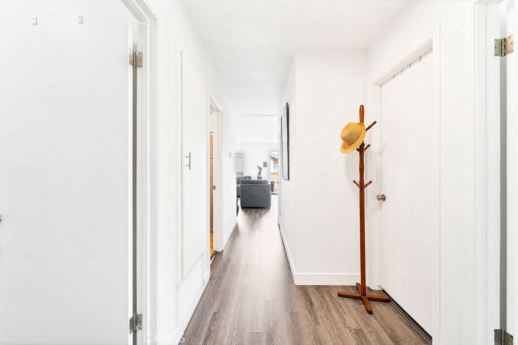 4267 Arcata Bay Way Oceanside, CA 92058 - Photo 13 of 34 a view of a bedroom from a hallway