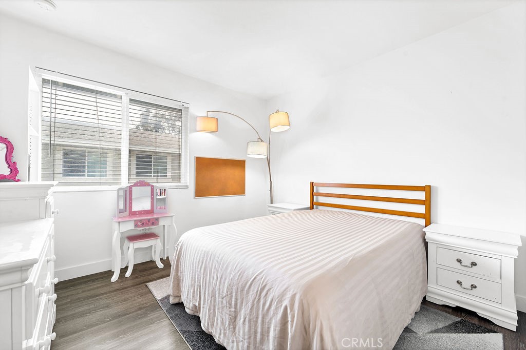 4267 Arcata Bay Way Oceanside, CA 92058 - Photo 15 of 34 a bedroom with a bed and a window