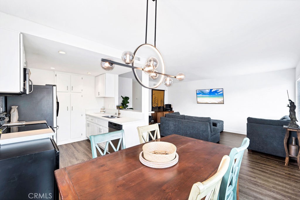 4267 Arcata Bay Way Oceanside, CA 92058 - Photo 22 of 34 a view of a dining room with furniture