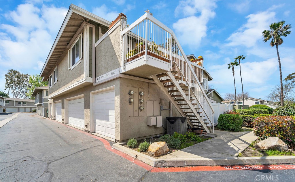 4267 Arcata Bay Way Oceanside, CA 92058 - Photo 3 of 34 a front view of a house with a yard