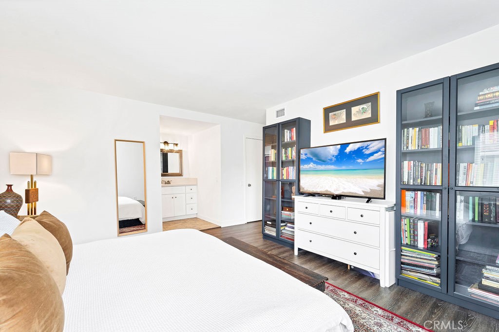 4267 Arcata Bay Way Oceanside, CA 92058 - Photo 9 of 34 a bed room with a bed and a television