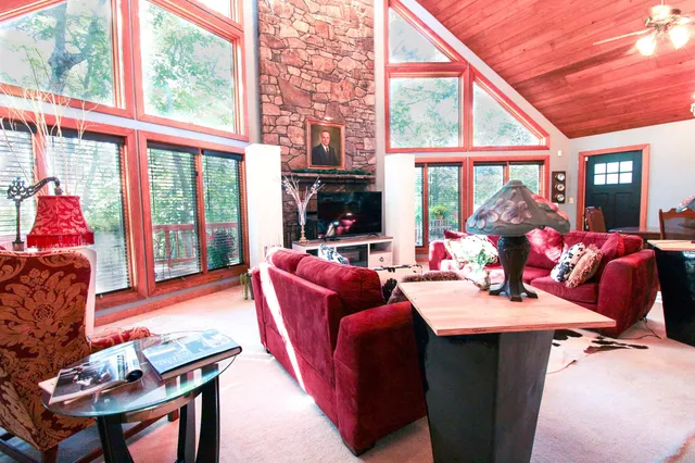 a kitchen with a table and chairs in it
