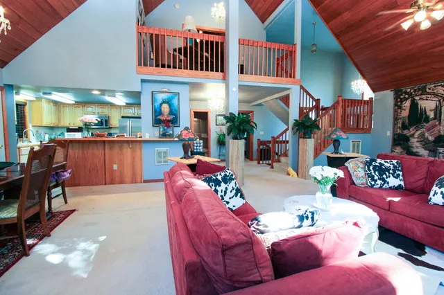a kitchen with stainless steel appliances a refrigerator sink and cabinets