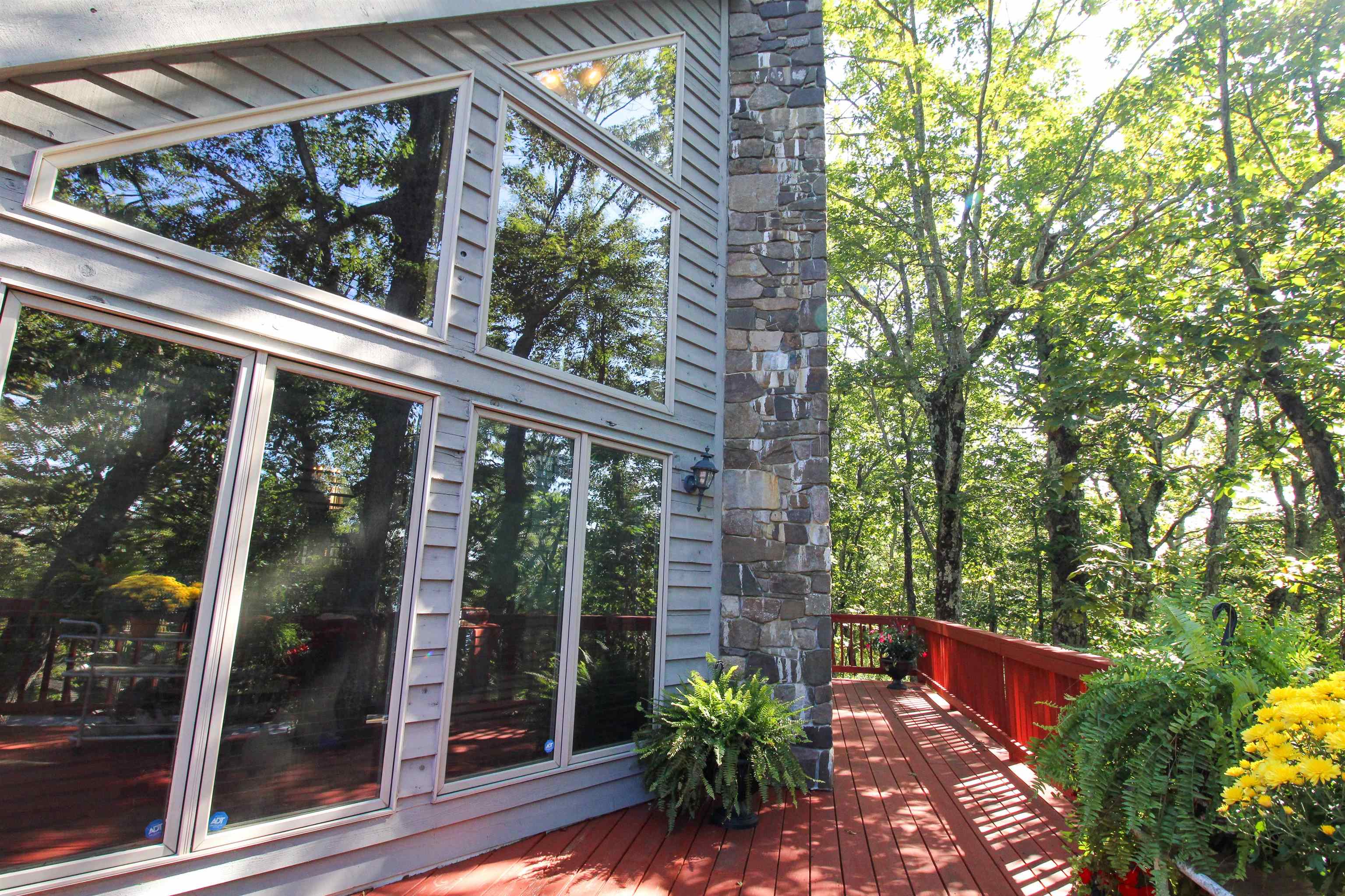 781 Devils Knob Loop Roseland, VA 22967 - Photo 3 of 68 a view of a balcony with flower plants