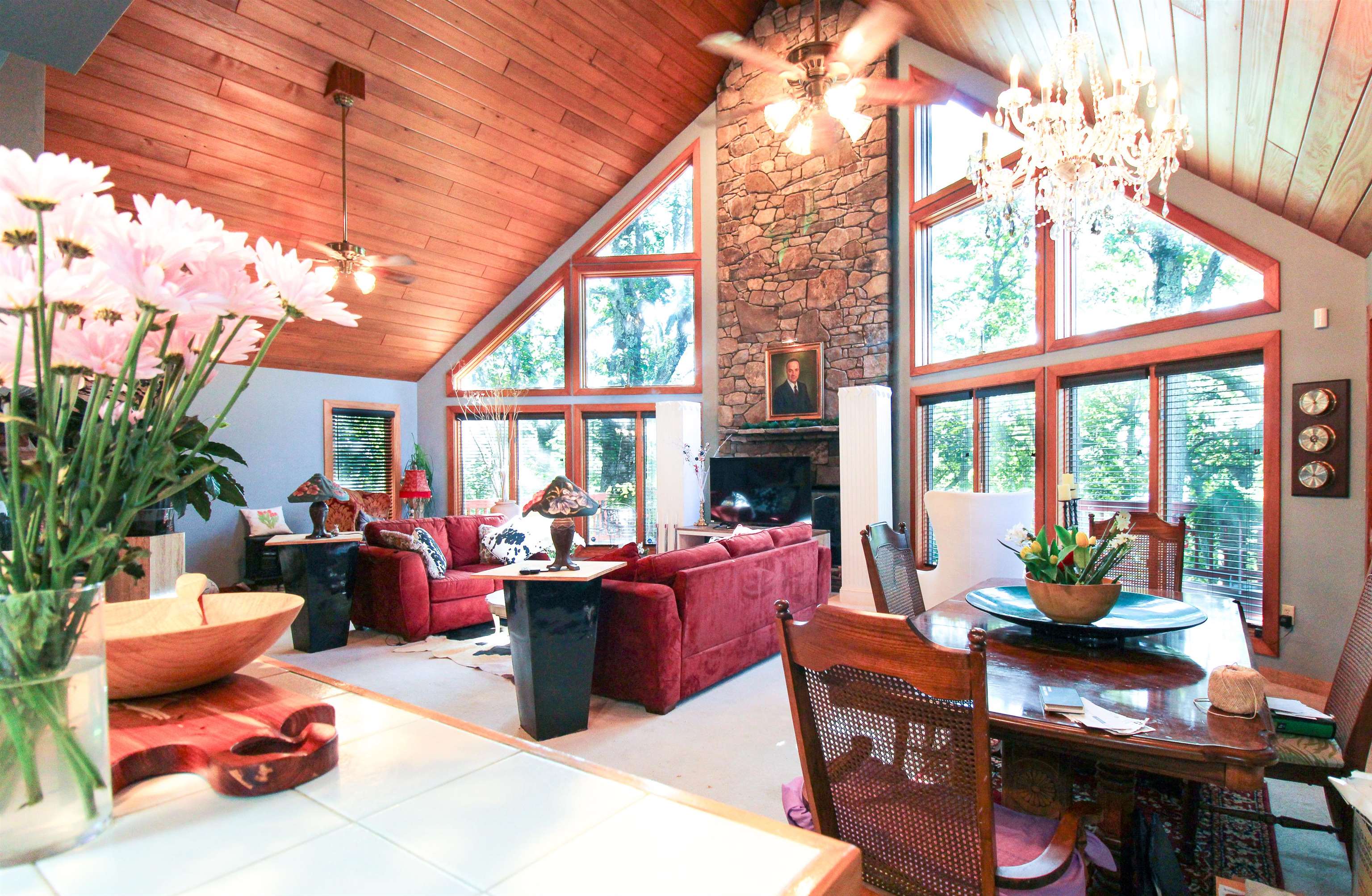 781 Devils Knob Loop Roseland, VA 22967 - Photo 32 of 68 a living room filled with furniture and floor to ceiling windows