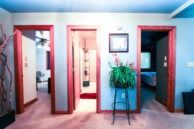 a wooden bench sitting in a yard