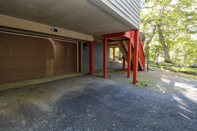 a view of a large building with a yard