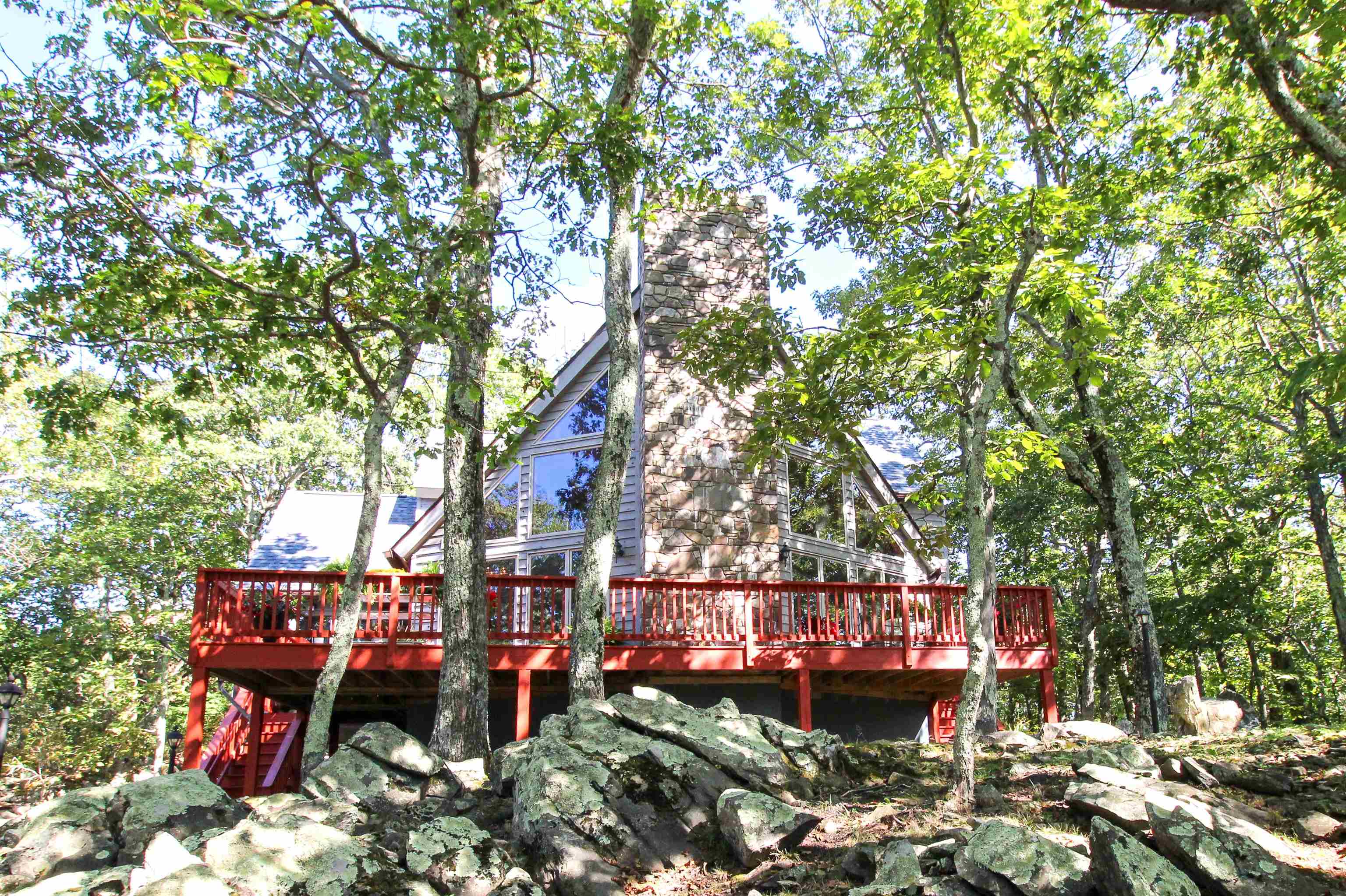 781 Devils Knob Loop Roseland, VA 22967 - Photo 49 of 68 a wooden bench sitting in a yard