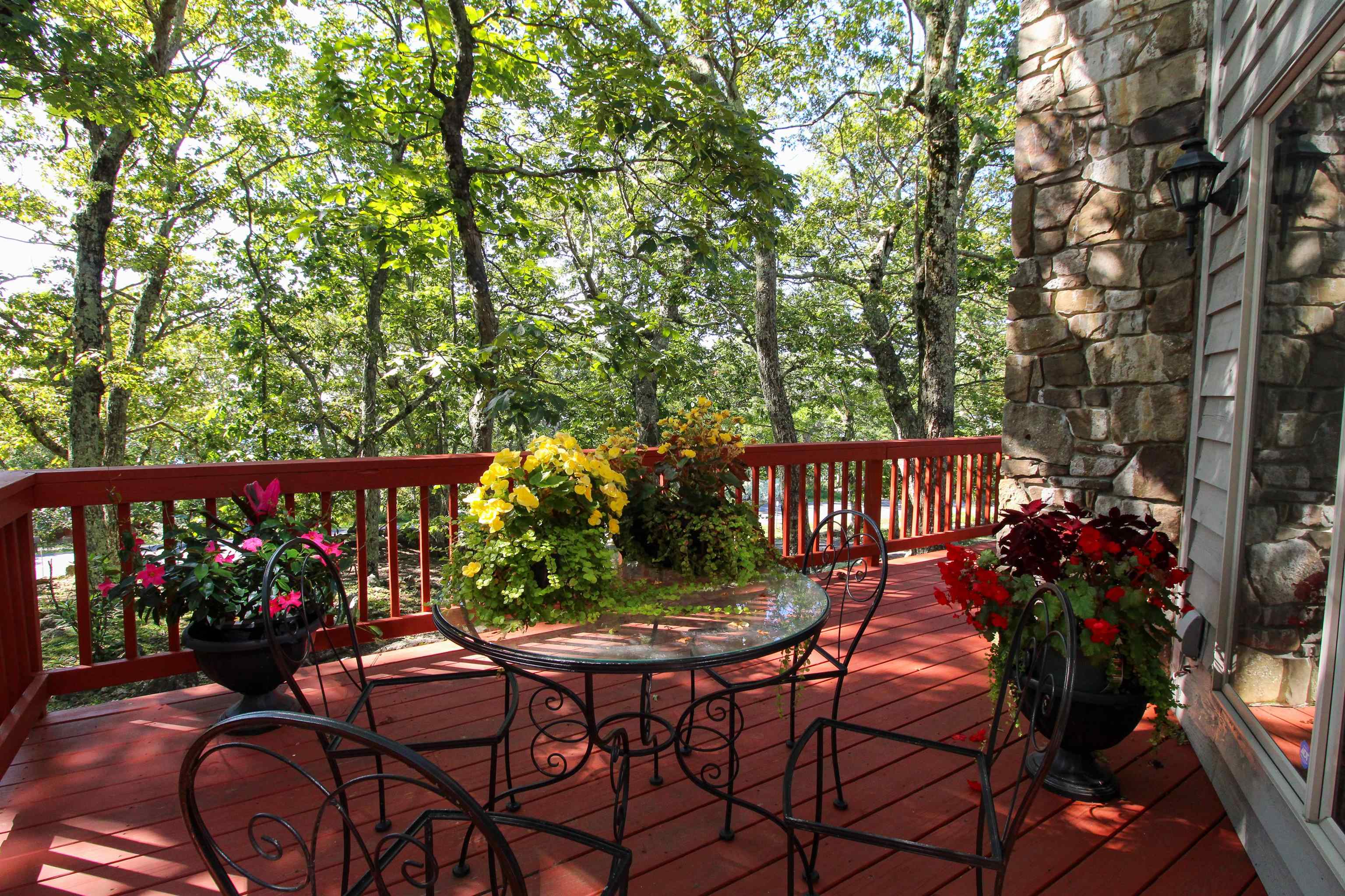 781 Devils Knob Loop Roseland, VA 22967 - Photo 9 of 68 a view of a chairs and table in the balcony