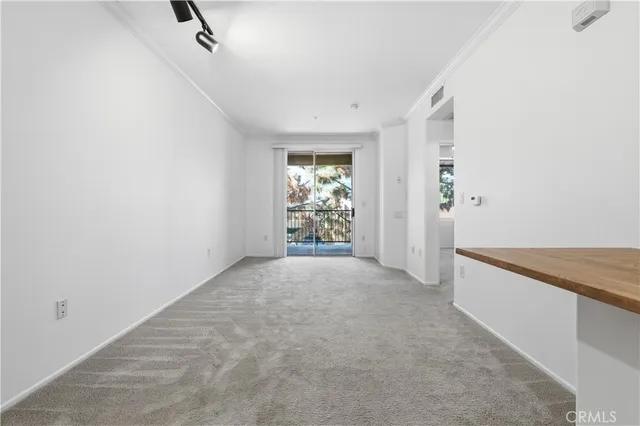 an empty room with a bathroom