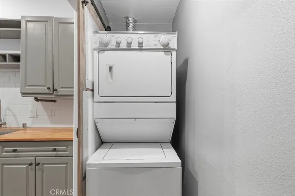 an empty room with a bathroom